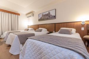 
Cama ou camas em um quarto em Hotel Bella Italia
