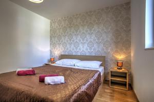 Postel nebo postele na pokoji v ubytování Apartment Ena 1