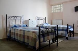 Voodi või voodid majutusasutuse Casa San Giacomo toas