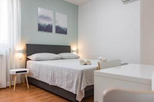 Postel nebo postele na pokoji v ubytování Apartment Anton, Fazana