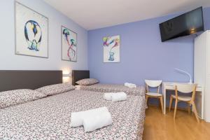 Postel nebo postele na pokoji v ubytování Apartment Anton, Fazana