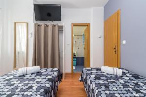 Postel nebo postele na pokoji v ubytování Apartment Anton, Fazana
