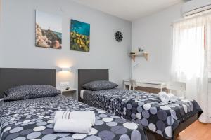 Postel nebo postele na pokoji v ubytování Apartment Anton, Fazana + 37 fotografií