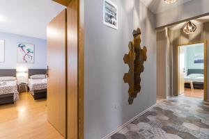 Postel nebo postele na pokoji v ubytování Apartment Anton, Fazana