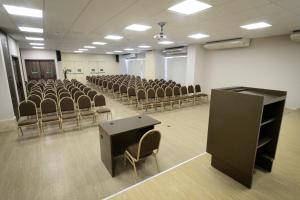 Área de negócios e/ou sala de conferências em Nord Luxxor Sapucaia mais 33 fotos