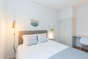 Кровать или кровати в номере Green Villas Douro