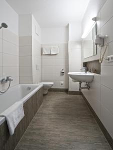 Koupelna v ubytování Gästehaus Obwexer + 32 fotografií
