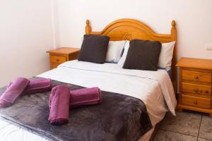Postel nebo postele na pokoji v ubytování APARTAMENTO LOS NARCISOS