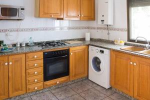 Kuchyň nebo kuchyňský kout v ubytování APARTAMENTO LOS NARCISOS
