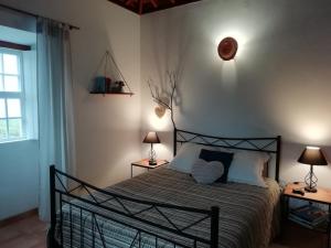 Casa do Norte - Santa Maria tesisinde bir odada yatak veya yataklar