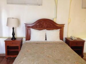 Postel nebo postele na pokoji v ubytování Hotel Meson del Mar