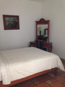 Postel nebo postele na pokoji v ubytování Hotel Meson del Mar