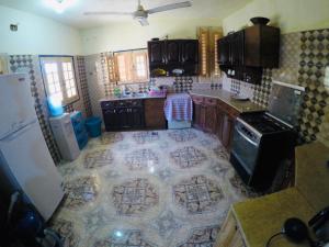 Kuchyň nebo kuchyňský kout v ubytování villa tunis village