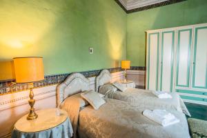 Postel nebo postele na pokoji v ubytování Buonvisi B&B
