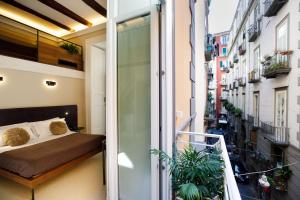 En balkon eller terrasse på MelRose Napoli
