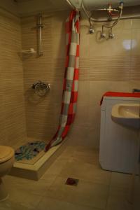 A bathroom at Τhe Sunny Apartments