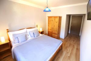 Posteľ alebo postele v izbe v ubytovaní Hotel Zámeček Janovičky