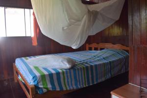 Postel nebo postele na pokoji v ubytování Casa Hospedaje Tingomaria + 11 fotografií