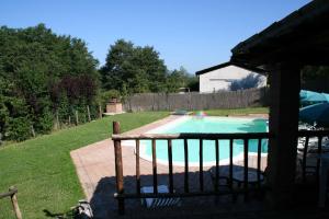 The swimming pool at or close to Borgo Di Fonni