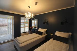 Krevet ili kreveti u jedinici u okviru objekta Hotel North