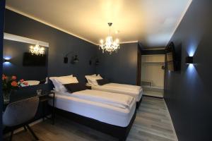 Krevet ili kreveti u jedinici u okviru objekta Hotel North