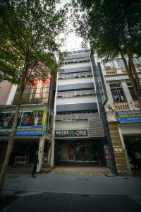 a man standing in front of a building at Hotel A-One in Kuala Lumpur +22 photos