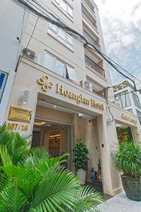 a building with a holisan hub sign on it at Hoang Lan Hotel in Ho Chi Minh City