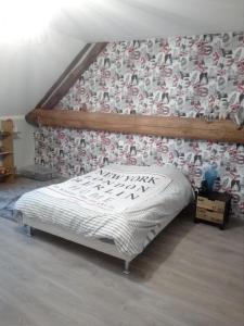 Ліжко або ліжка в номері Chambres chez l habitant
