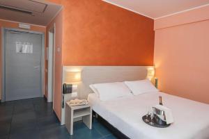Postel nebo postele na pokoji v ubytování Hotel Testani Colleferro
