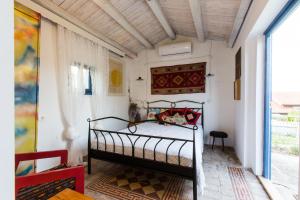 a bedroom with a bed in a room at Apartments Novka in Izola