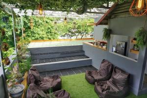 Posezení v ubytování Kokos Hostel Padang City