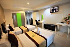 TV a/nebo společenská místnost v ubytování Retreat Resort Pattaya