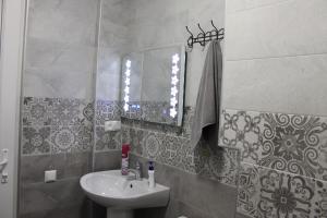 Koupelna v ubytování Guest House Lviv Грузия