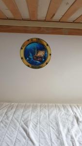 En eller flere senger på et rom på Le Nautilus - 2 adultes 3 enfants - Canet Plage - Vue Mer - Place Mediterranée