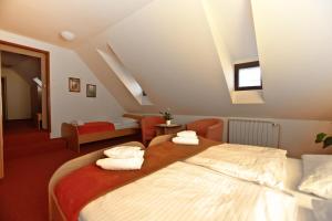 Postel nebo postele na pokoji v ubytování Hotel Paradies