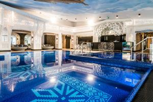 Bazén v ubytování Bachleda Hotel Kasprowy nebo v jeho okolí