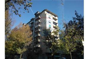 a tall apartment building with trees in front of it at LUST STUDIO GULLI in Milan
