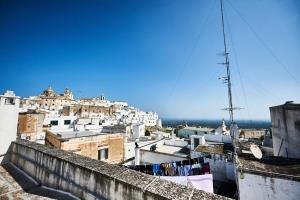 a view of a city from the roof of a building at EQUORUM 13 - Ostuni Centro in Ostuni