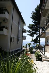 an apartment building with a view of the ocean at Villa Nova in Ohrid