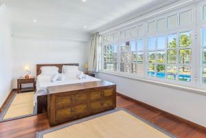 Postel nebo postele na pokoji v ubytování Villa Maia + 28 fotografií