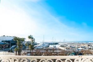 a view of a harbor with a marina at Hotel Splendid in Cannes