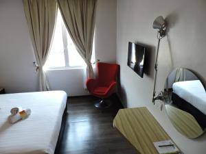 TV a/nebo společenská místnost v ubytování The Blanket Hotel Seberang Jaya