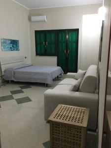 Postel nebo postele na pokoji v ubytování B&B Aliga