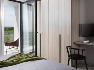 Postel nebo postele na pokoji v ubytování Villa Paola by Interhome