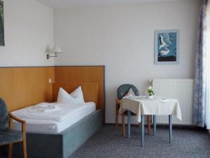 เตียงในห้องที่ Hotel Diekgerdes Standard