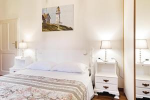 Кровать или кровати в номере Bologna Zanolini Apartment