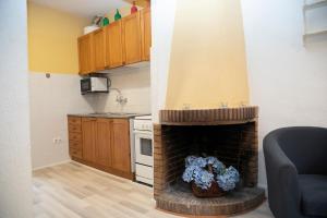 Kuchyň nebo kuchyňský kout v ubytování Holiday home Can Clerc