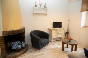 TV a/nebo společenská místnost v ubytování Holiday home Can Clerc