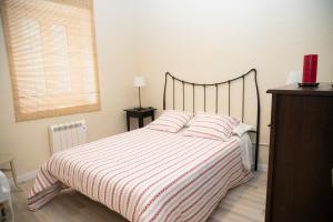 Postel nebo postele na pokoji v ubytování Holiday home Can Clerc
