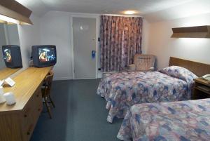 TV a/nebo společenská místnost v ubytování Daigle's Motel
